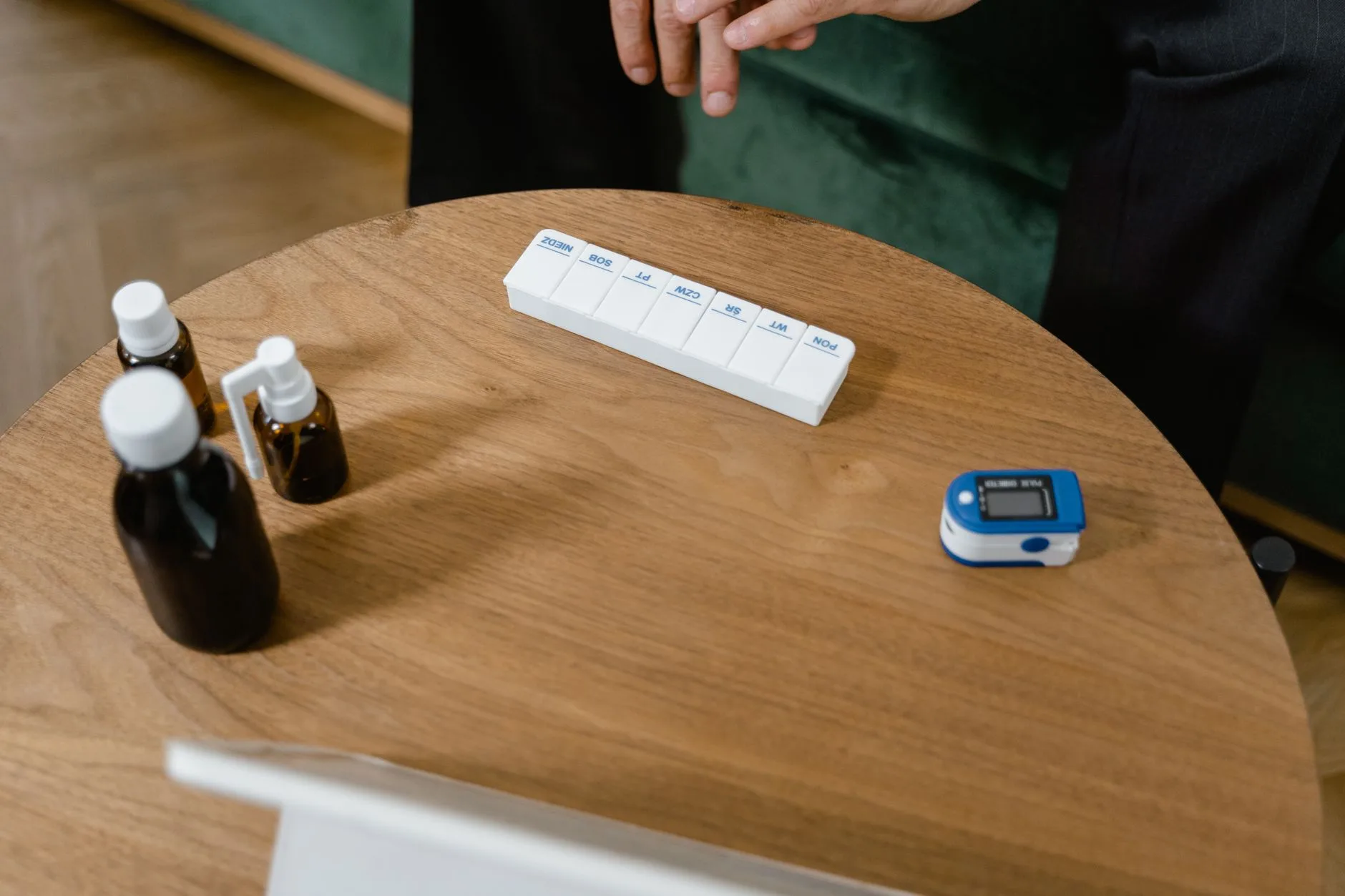 pill organizer on kitchen table