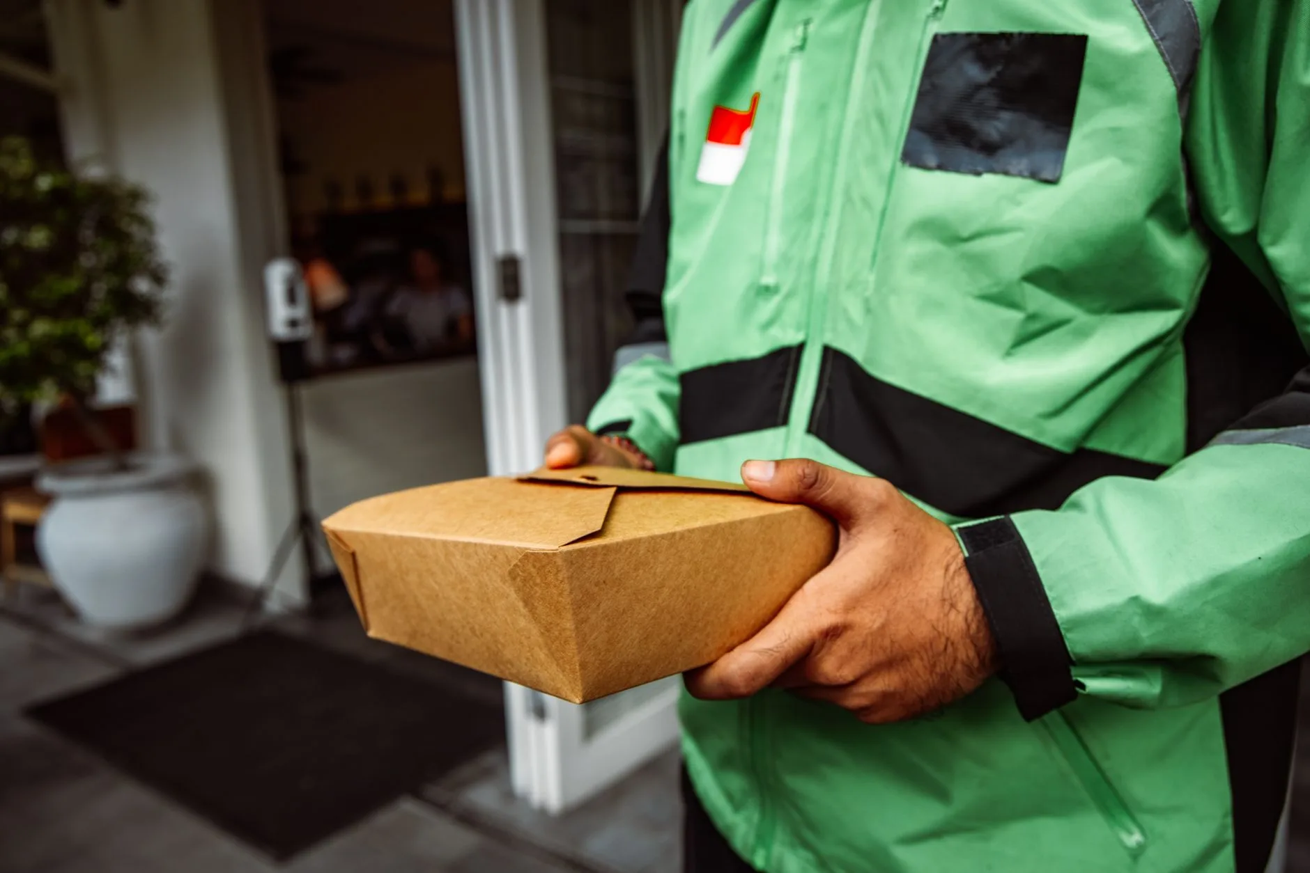 delivery package on doorstep supplement box