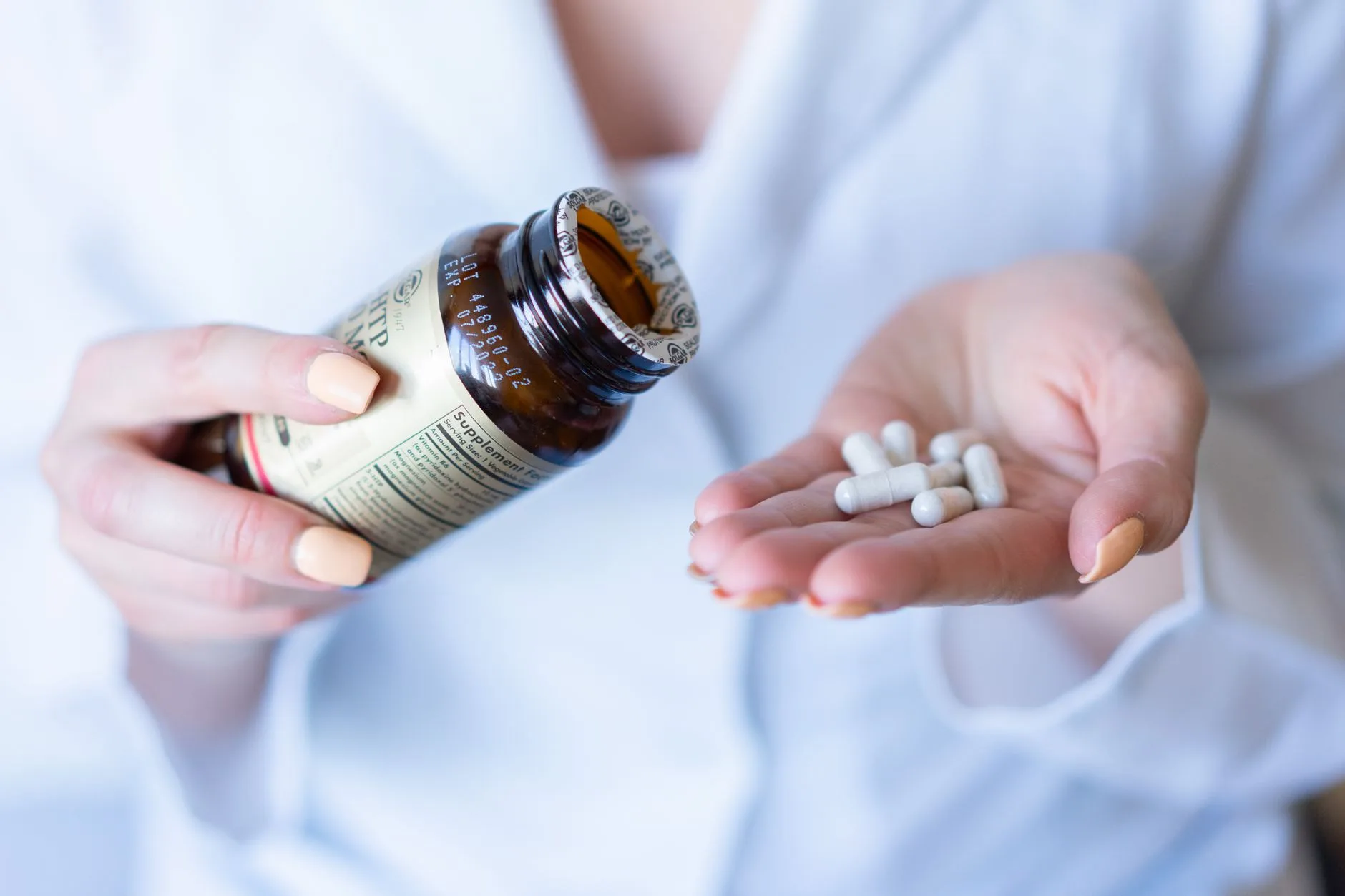 bottle of natural glucose supplement capsules on kitchen counter