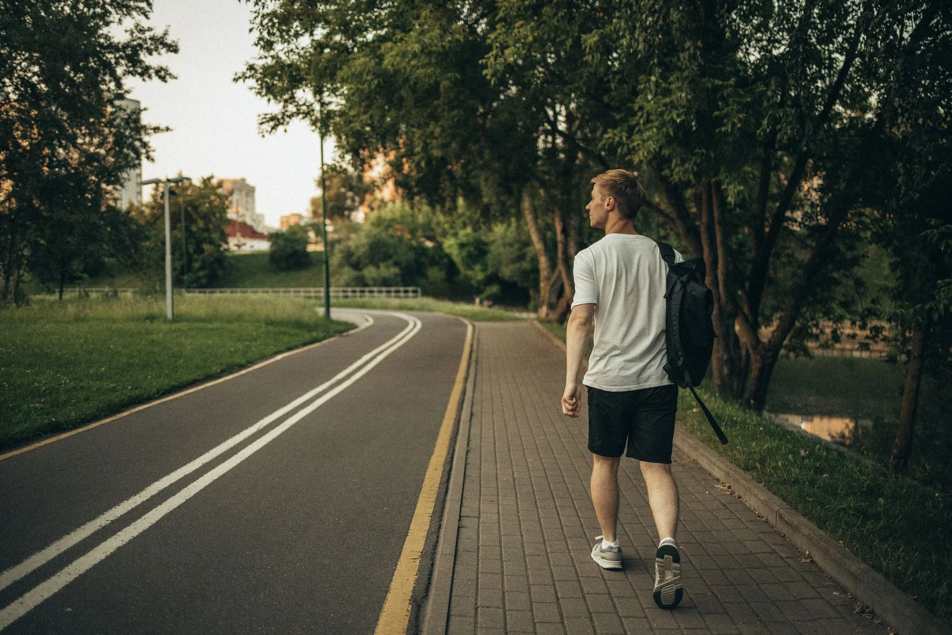 person walking outdoors after a meal