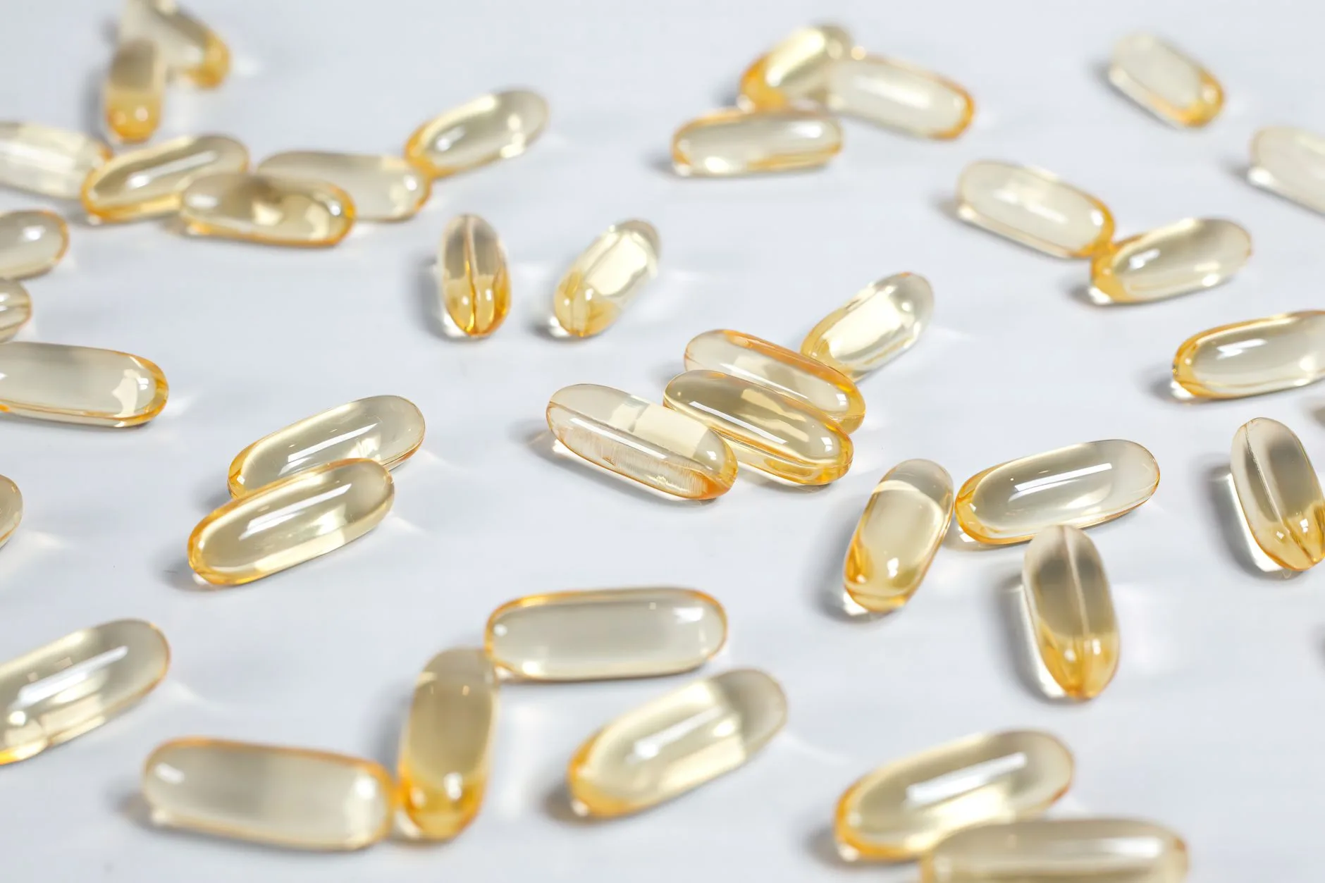 thermogenic supplement capsules on white surface