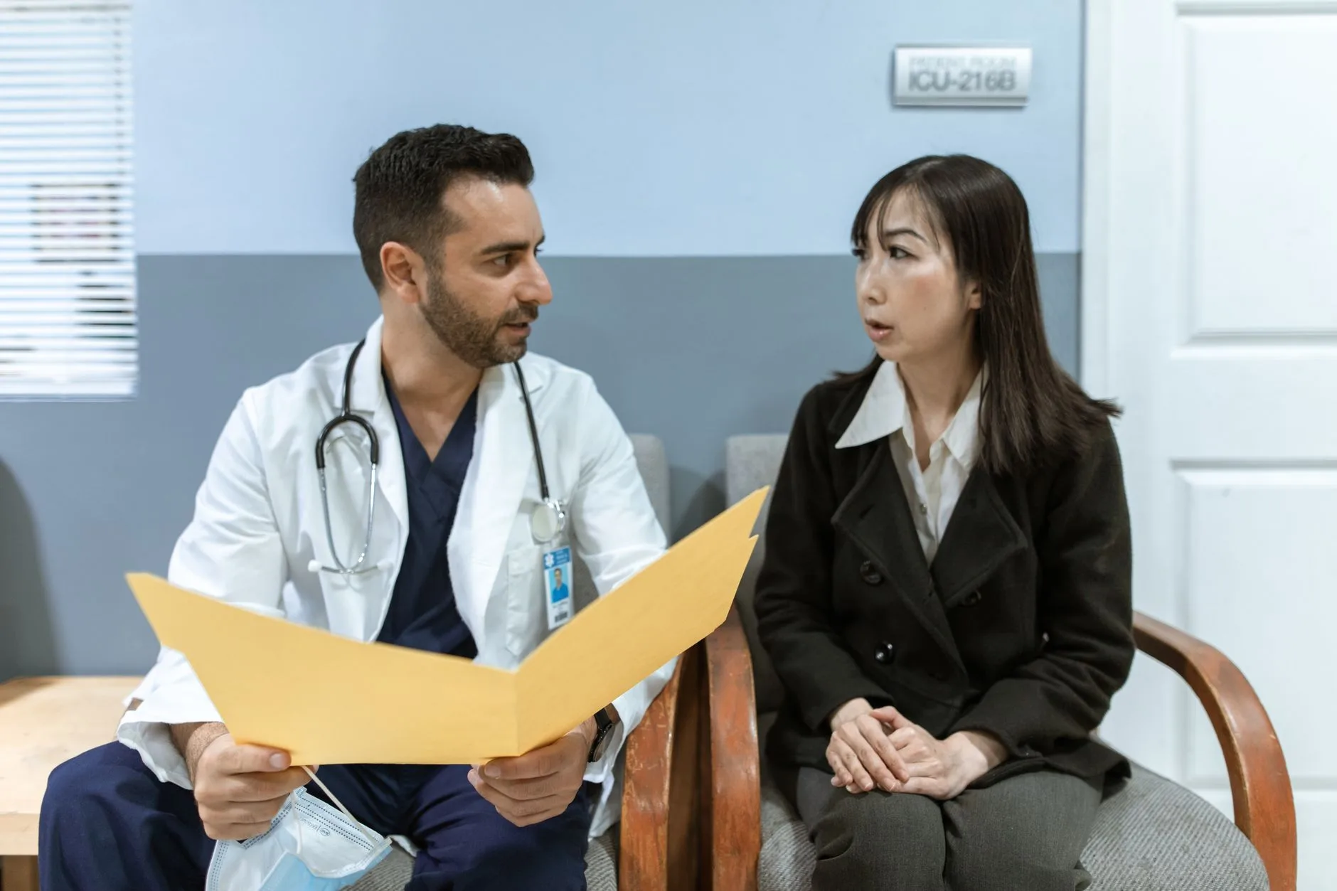 doctor consulting senior patient about memory loss