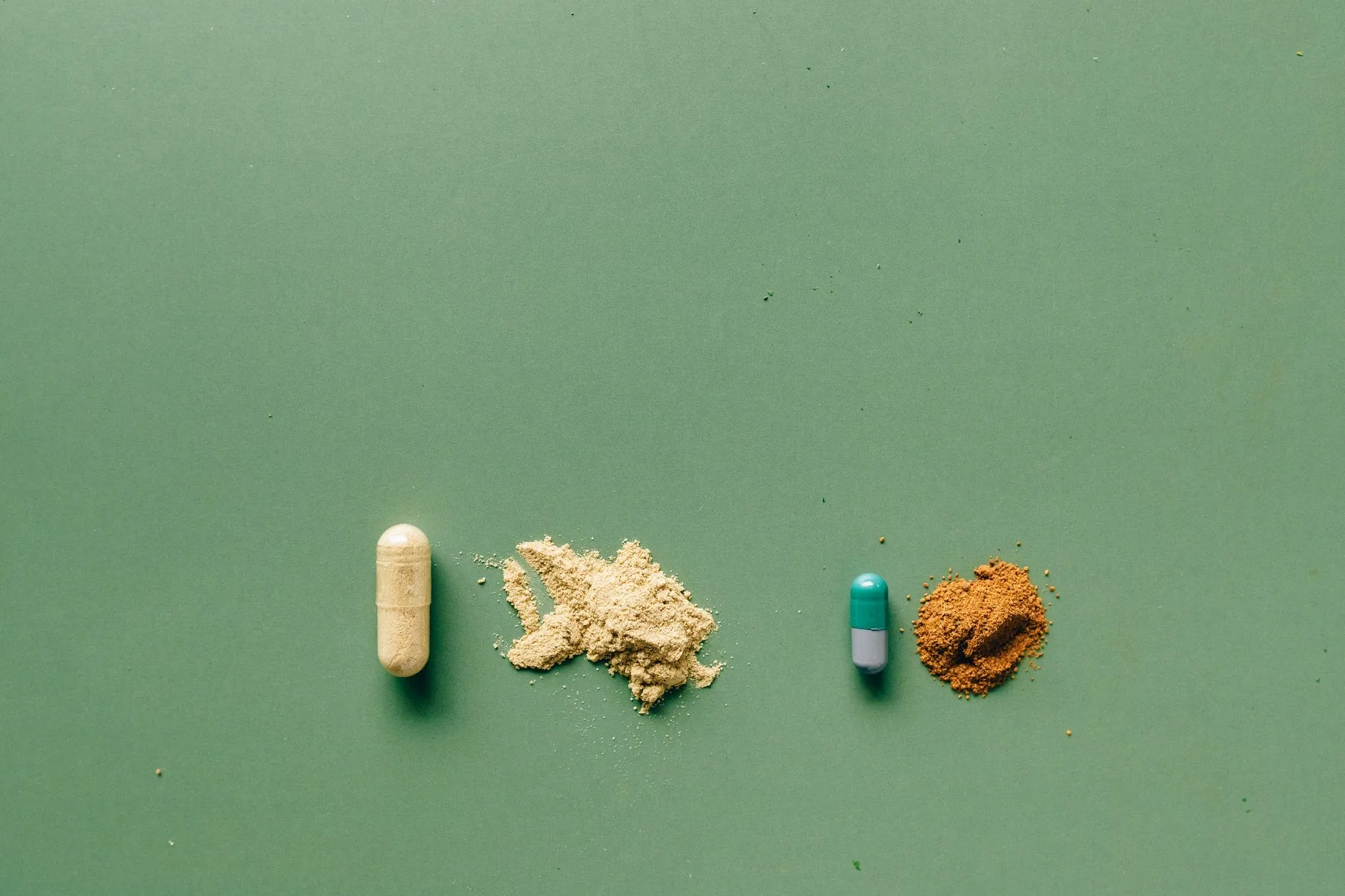 appetite control supplements — assortment of appetite control supplements capsules and fiber powder on table