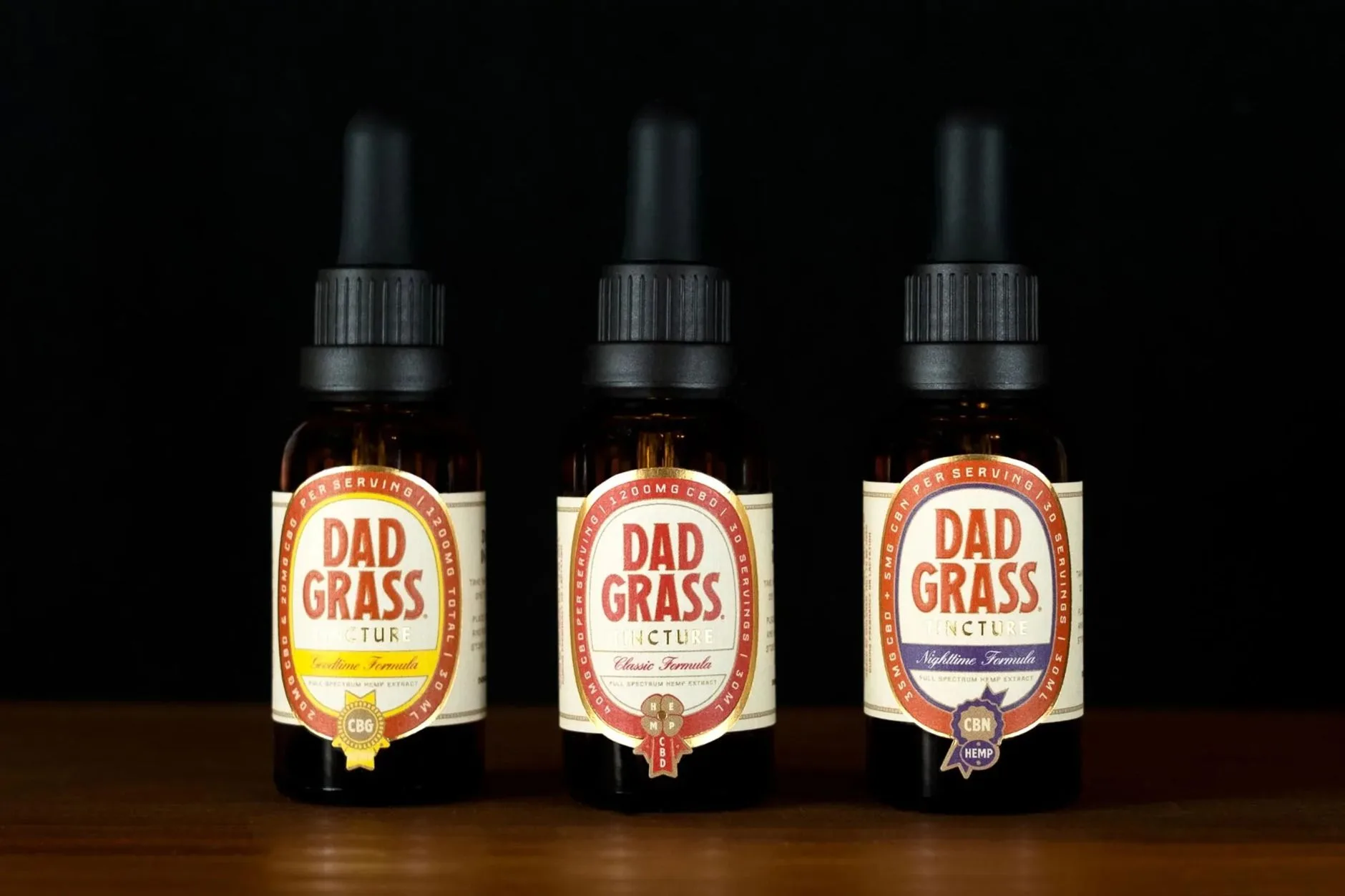 three bottles of natural fat burner weight loss drops lined up