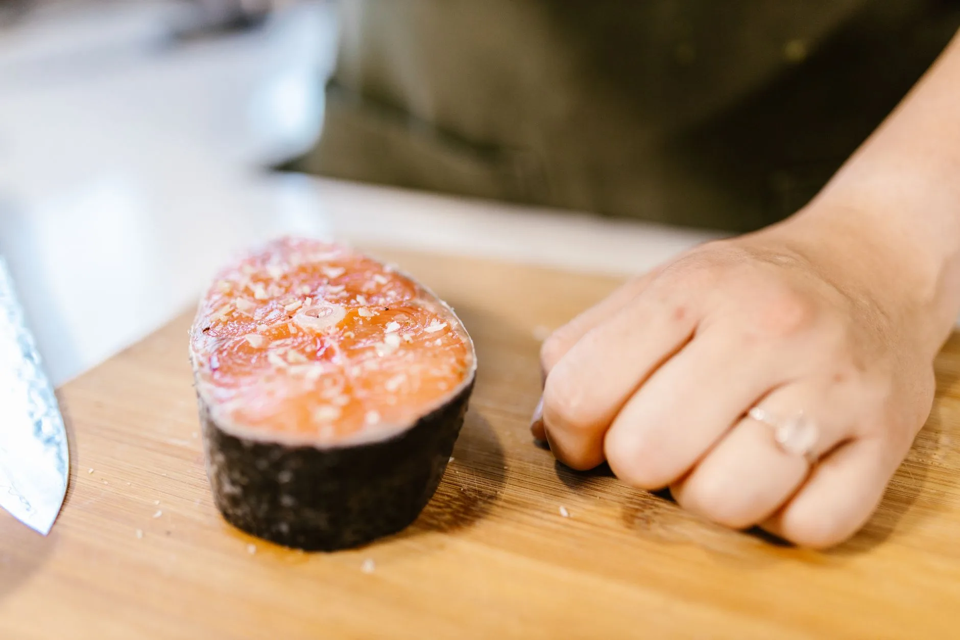 woman over 50 preparing healthy protein rich meal